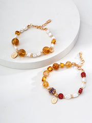 The Aura of Abundance Bracelet | Amethyst, Amber & Coin Charm