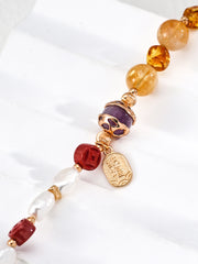 The Aura of Abundance Bracelet | Amethyst, Amber & Coin Charm