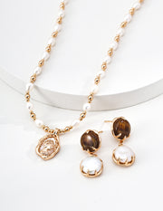 The Sovereign Pearl Necklace: Fluid Gold & Wheat Crown Cameo
