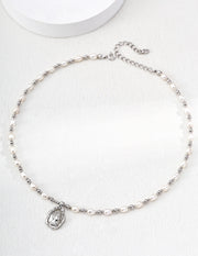 The Sovereign Pearl Necklace: Fluid Gold & Wheat Crown Cameo