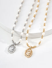 The Sovereign Pearl Necklace: Fluid Gold & Wheat Crown Cameo